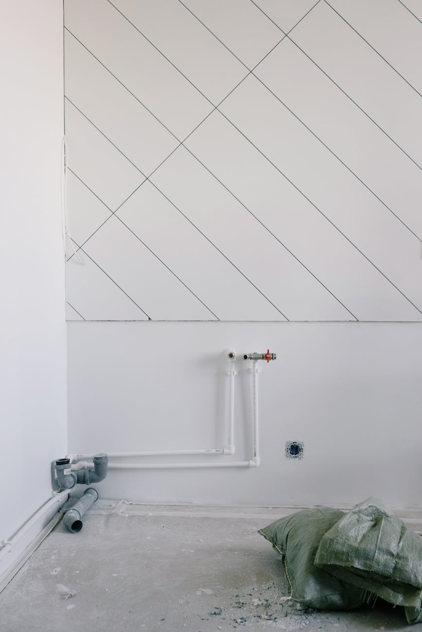 litter by pipes in new apartment after repair